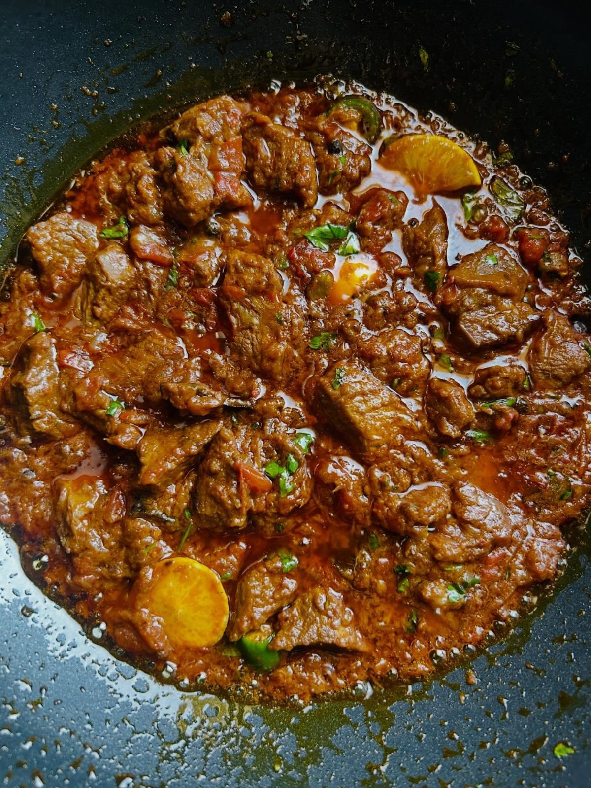 Bhuna Gosht Masala with tender bone-in lamb in a rich spiced gravy